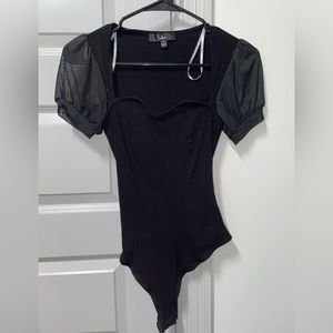 Lulu’s bodysuit. Mesh sleeves. Never worn. Size S